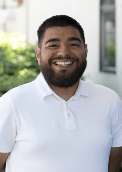 Professional headshot of Andres Alvarado.